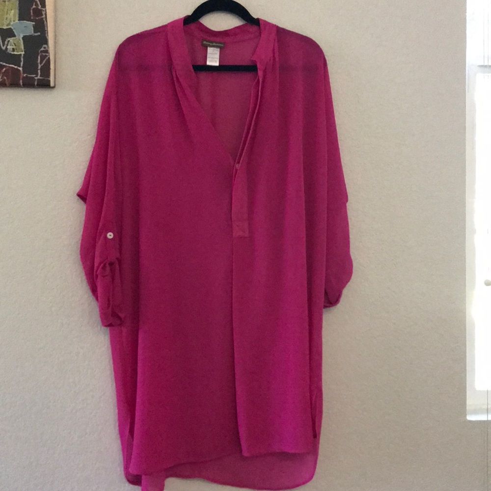 Bright pink blouse.